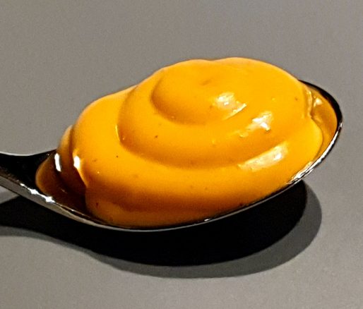 Whiskysaus op een lepel